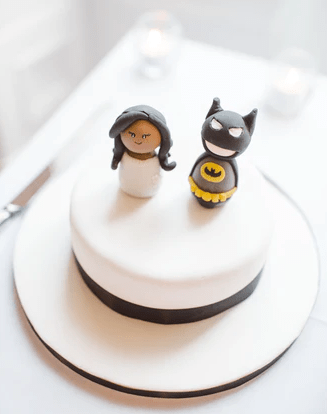figures on a wedding cake by Tom the Photographer on Unsplash