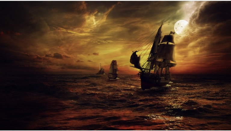 The picture shows a stormy sea with an old ship battling the winds.